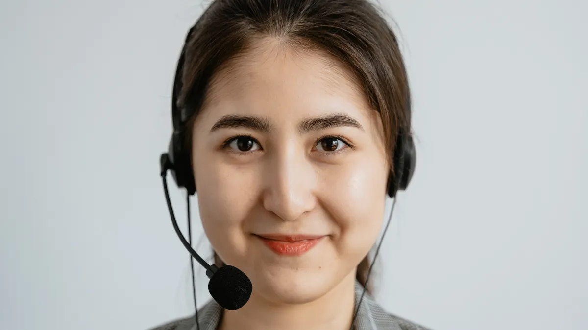 close-up of a support agent wearing a headset