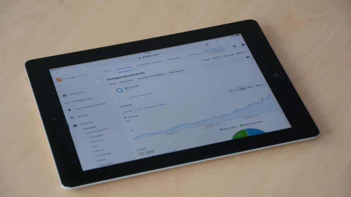 Best product analytics tools for SaaS startups tablet displaying an analytics dashboard