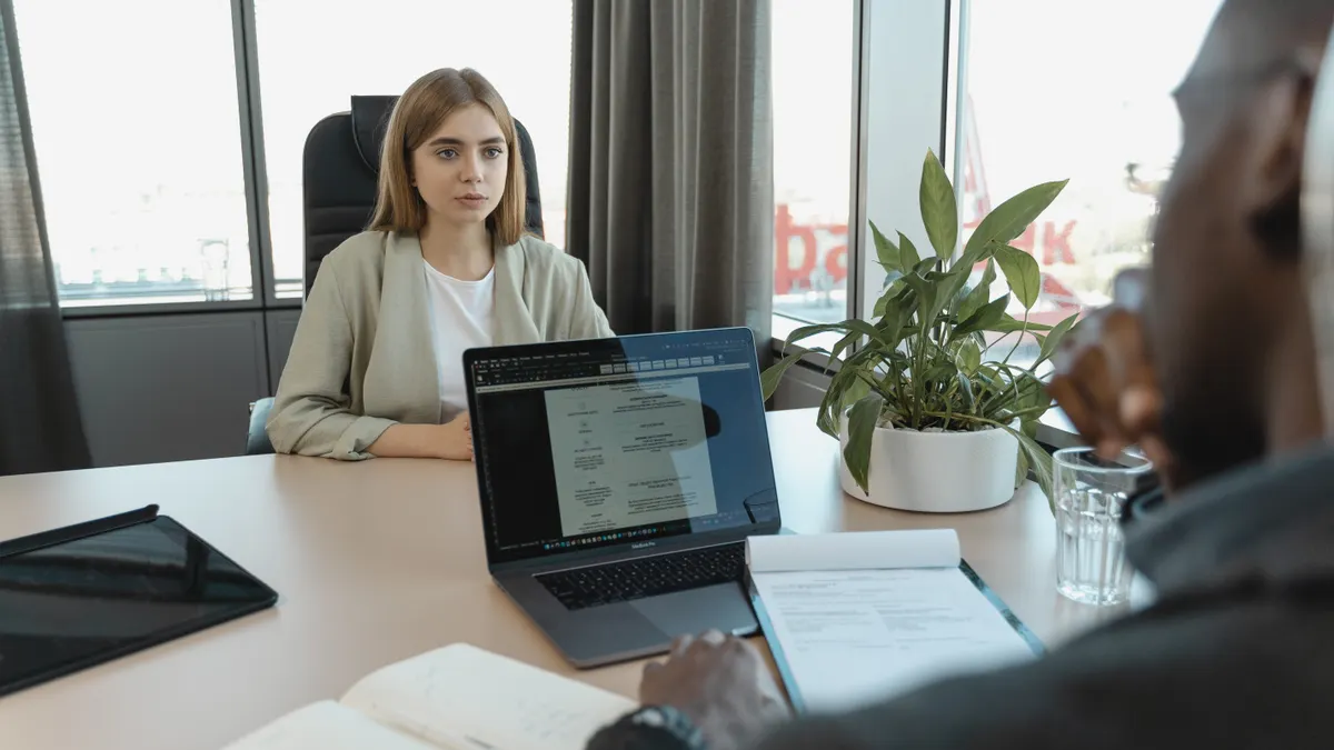 Cluster F hiring guide for early SaaS teams: key roles, compensation signals, and interview templates Cluster F hiring guide for early SaaS teams: key roles, compensation signals, and interview templates — Candidate having
