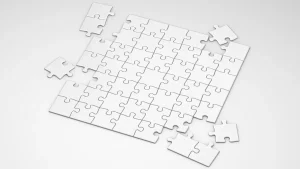 Partially assembled puzzle board with loose pieces